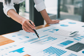 Close up view of bookkeeper or financial inspector hands making report, calculating or checking balance. Home finances, investment, economy, saving money or insurance concept.