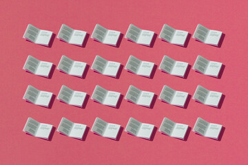 The books pattern seamless on pink background.