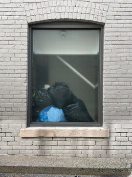 Garbage bags in a window