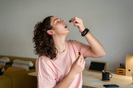 Teenager ingesting essential oil