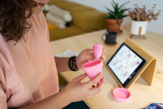Teen testing menstrual cups