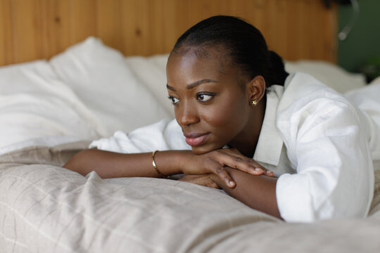 A portrait of a black beautiful woman at home