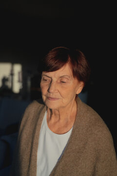 Portrait Of Elderly Woman In Sun