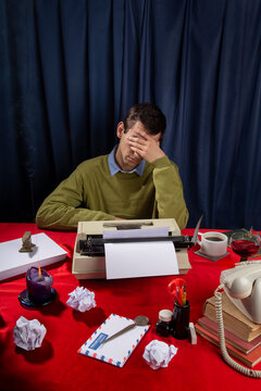 Anonymous man at the office desk