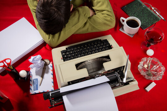 Man sleeping on office desk