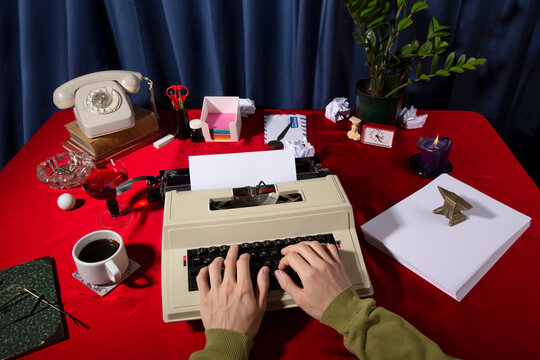 Office worker typing on typewriter / Still life