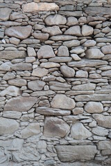 Stone wall texture, mountain landscape.