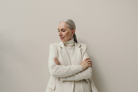 Elegant Senior Woman With Gray Hair Portrait In Studio