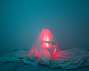 Mysterious person under the sheets