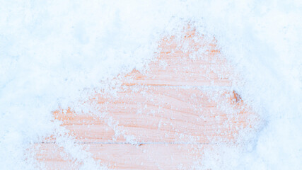 Winter wood. Christmas board with old rustic wall, white frozen snow . Winter wooden texture background. inimal flat lay.