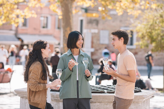 Young Adults Having An Aperitif Outdoors