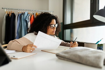 Latin woman working in workplace