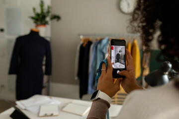 Woman taking pics to mannequin