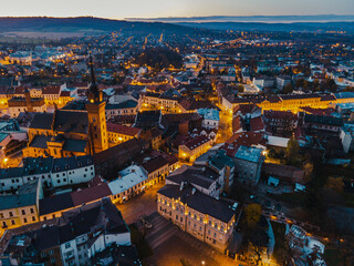 Fototapeta premium Tarnow City in Poland. Old Town Aerial Drone View at Night