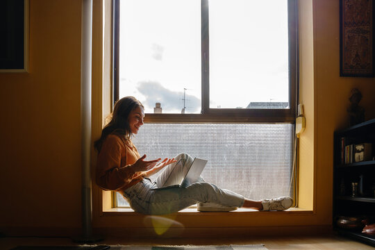 Woman doing video call at home