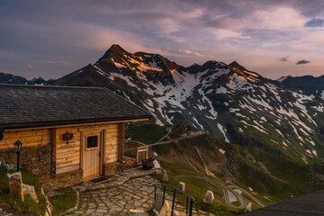 Chalet on Mountain Top Overlooking Grossglockner Alpine Road and Alps at Sunrise