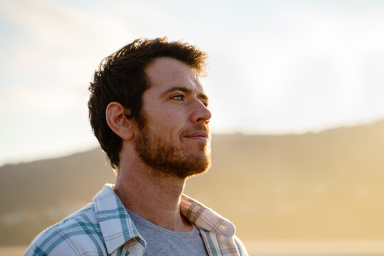 Portrait of relaxed man at sunset