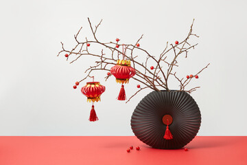 Chinese red lanterns and black vase