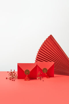 Envelopes, berries and origami fan