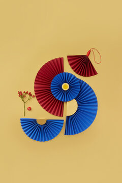 Origami fans and berries