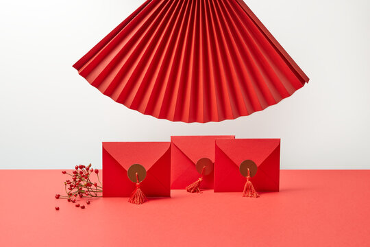 Three envelopes and origami fan