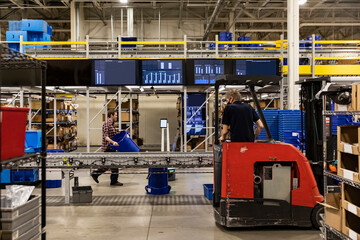 Busy Warehouse floor with forklift
