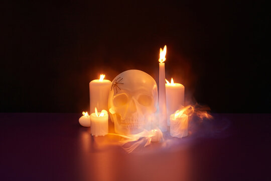 Skull with spider and candles