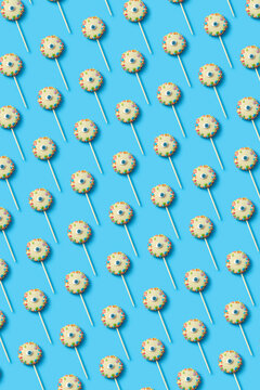 Pattern of funny sweet lollipops with eyes