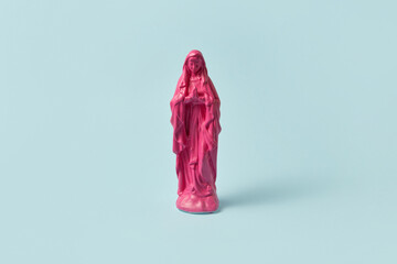Praying pink Virgin Mary statue