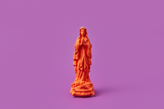 Orange Virgin Mary statue