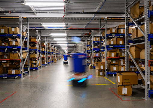 Robots at Warehouse of E-Commerce Distribution floor