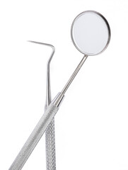 Dental mirror instrument on white background.
