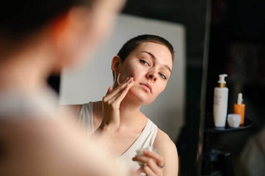 Girl Applying Face Cream