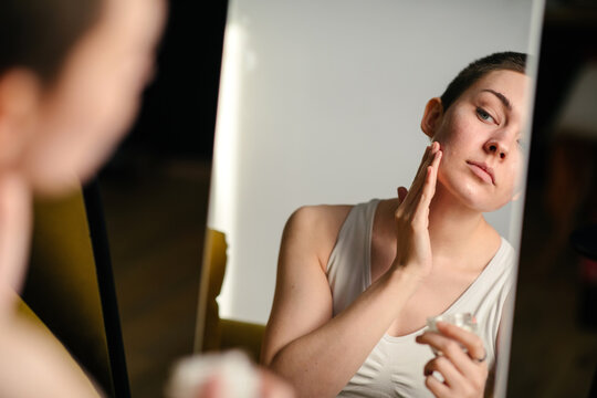 Girl Applying Face Cream