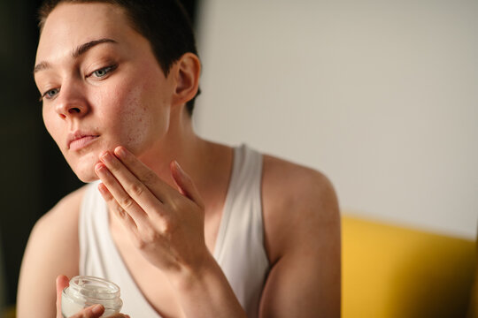 Girl Applying Face Cream