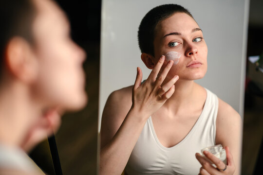 Girl Applying Face Cream