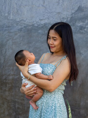 Woman and baby Asian and nationality Thai is happy feel