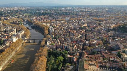 Fototapeta premium Aerial drone flight over famous Rome district of Trastevere with beautiful Roman architecture, Italy