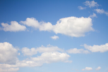 Naklejka na ściany i meble blue sky background with soft clouds