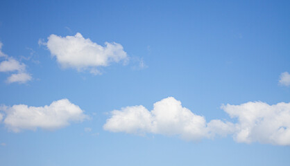 Fototapeta na wymiar blue sky background with soft clouds