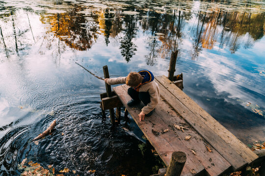 The boy on the pond.