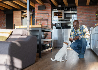 Man Going To Give Dog Dainty