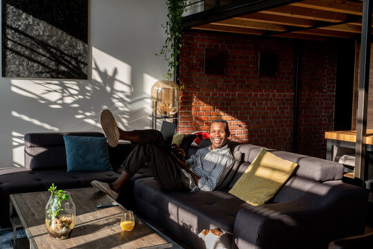 Happy Man At Stylish Home