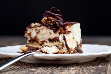 chocolate cream cake covered with milk chocolate