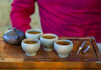 Fototapeta na wymiar Chinese Ceramic Tea Set. Traditional tableware for tea drinking.