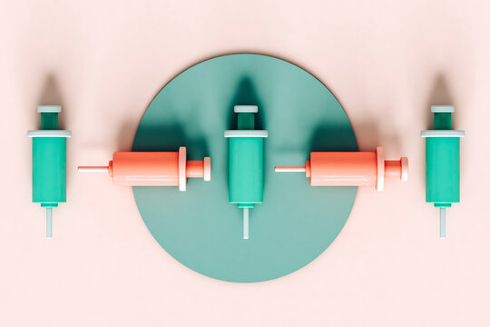 overhead view of cartoon 3d syringes on pastel pink