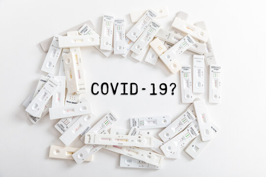 Covid Rapid antigen tests on white background with text covid-19
