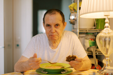 senior man, portrait at home