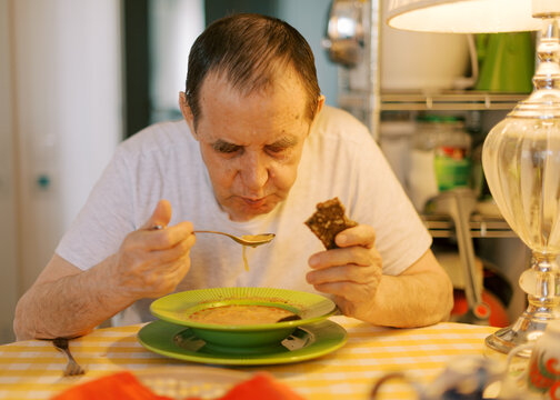 senior man, portrait at home