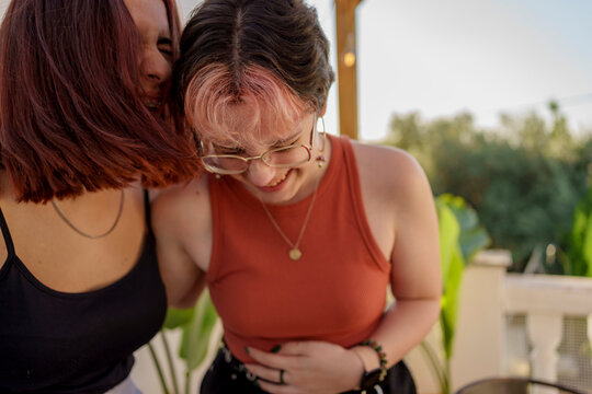 Teen friends luaghing portrait